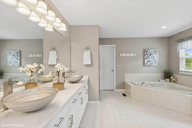 527 Capital Ln, Gurnee, IL 60031 - full bath featuring double vanity, a bath, and tile patterned flooring