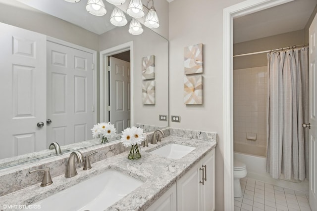 527 Capital Ln, Gurnee, IL 60031 - full bathroom featuring double vanity, tile patterned floors, and shower / bath combination with curtain