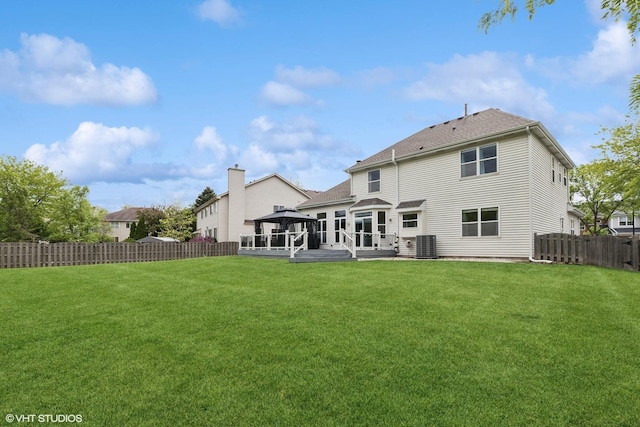 527 Capital Ln, Gurnee, IL 60031 - back of house with a gazebo, a fenced backyard, and roof with shingles