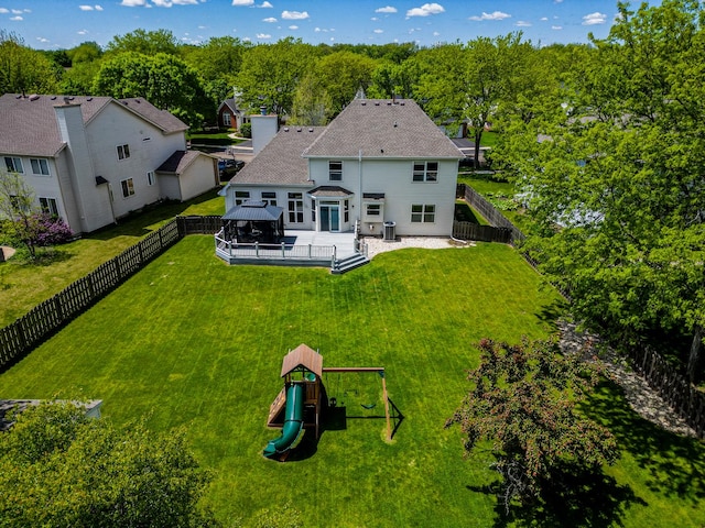 527 Capital Ln, Gurnee, IL 60031 - back of property featuring a wooden deck, a fenced backyard, a playground, and a gazebo
