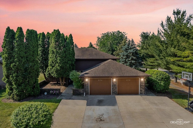 272 Maple St, Sugar Grove, IL 60554 - obstructed view of property featuring concrete driveway, an attached garage, and roof with shingles