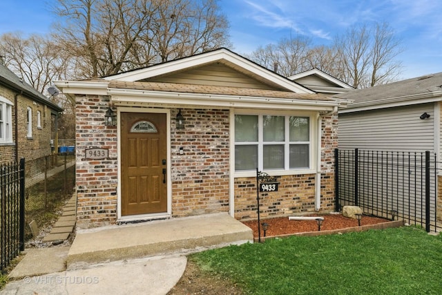 9433 S Burnside Ave, Chicago, IL 60619 - doorway to property featuring brick siding