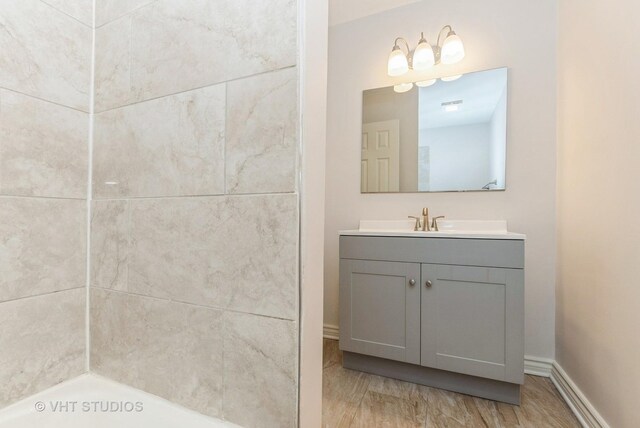 9433 S Burnside Ave, Chicago, IL 60619 - bathroom featuring vanity and baseboards