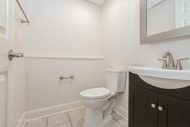 9433 S Burnside Ave, Chicago, IL 60619 - half bathroom with vanity and wood finish floors