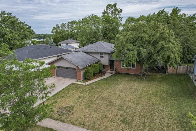 3917 Jonathan Simpson Dr, Joliet, IL 60431 - view of front of home with brick siding, a garage, concrete driveway, and roof with shingles