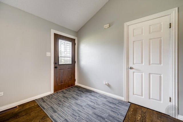 3917 Jonathan Simpson Dr, Joliet, IL 60431 - foyer featuring lofted ceiling and dark wood-type flooring