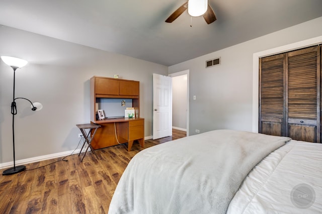 3917 Jonathan Simpson Dr, Joliet, IL 60431 - bedroom with a closet, wood finished floors, a ceiling fan, and a desk