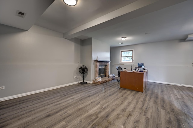 3917 Jonathan Simpson Dr, Joliet, IL 60431 - office area with a brick fireplace and wood finished floors