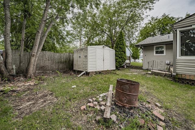 3917 Jonathan Simpson Dr, Joliet, IL 60431 - view of yard featuring a storage unit