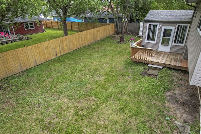 3917 Jonathan Simpson Dr, Joliet, IL 60431 - fenced backyard with a deck