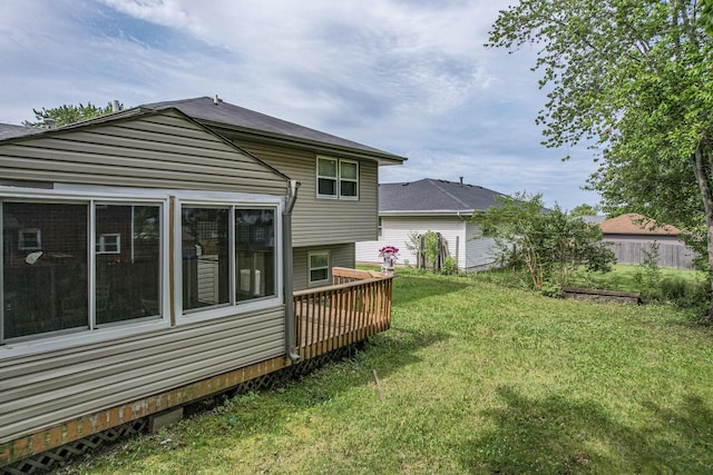 3917 Jonathan Simpson Dr, Joliet, IL 60431 - back of house with a lawn and a wooden deck