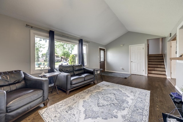 3917 Jonathan Simpson Dr, Joliet, IL 60431 - living room featuring lofted ceiling, stairway, and dark wood-style floors