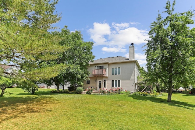 2708 High Meadow Rd, Naperville, IL 60564 - back of property with a balcony, a lawn, and a chimney