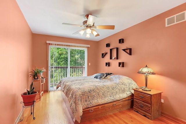 2708 High Meadow Rd, Naperville, IL 60564 - bedroom featuring access to exterior, light wood-style flooring, and a ceiling fan