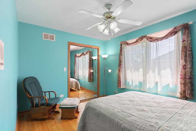 2708 High Meadow Rd, Naperville, IL 60564 - bedroom with wood finished floors, a closet, and a ceiling fan