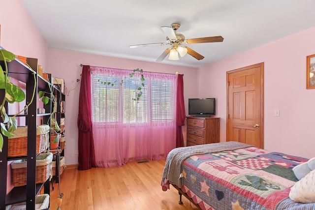 2708 High Meadow Rd, Naperville, IL 60564 - bedroom featuring light wood finished floors and ceiling fan