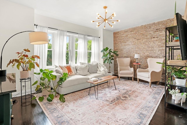4006 W Wellington Ave Unit 3, Chicago, IL 60641 - living area featuring brick wall, a chandelier, and wood finished floors