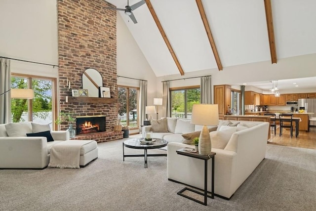 22902 W Lochanora Dr, Hawthorn Woods, IL 60047 - living area featuring high vaulted ceiling, a brick fireplace, beamed ceiling, and ceiling fan