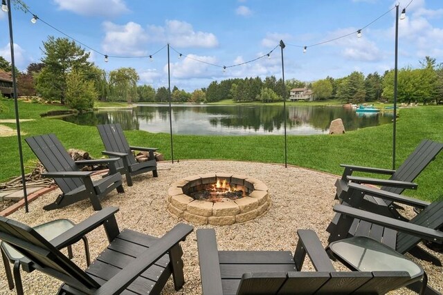 22902 W Lochanora Dr, Hawthorn Woods, IL 60047 - view of community featuring an outdoor fire pit, a water view, and a yard