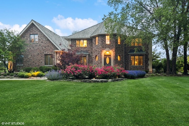 22902 W Lochanora Dr, Hawthorn Woods, IL 60047 - view of front of house with a front yard, brick siding, and a high end roof