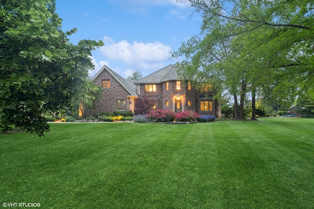 22902 W Lochanora Dr, Hawthorn Woods, IL 60047 - view of front facade with a front lawn and brick siding