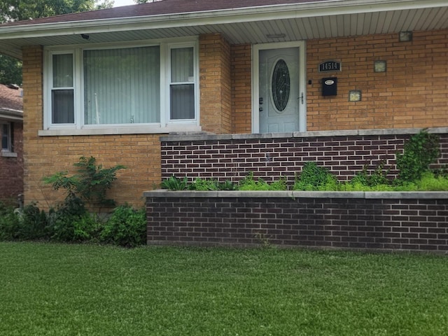 14514 Minerva Ave, Dolton, IL 60419 - entrance to property with a yard and brick siding