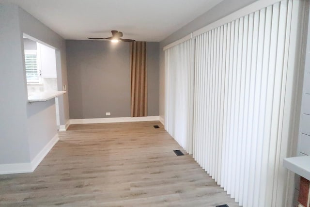 369 Ferndale Ct Unit B1, Schaumburg, IL 60193 - spare room featuring ceiling fan and light wood-style floors