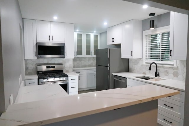 369 Ferndale Ct Unit B1, Schaumburg, IL 60193 - kitchen with appliances with stainless steel finishes, light stone countertops, tasteful backsplash, and recessed lighting