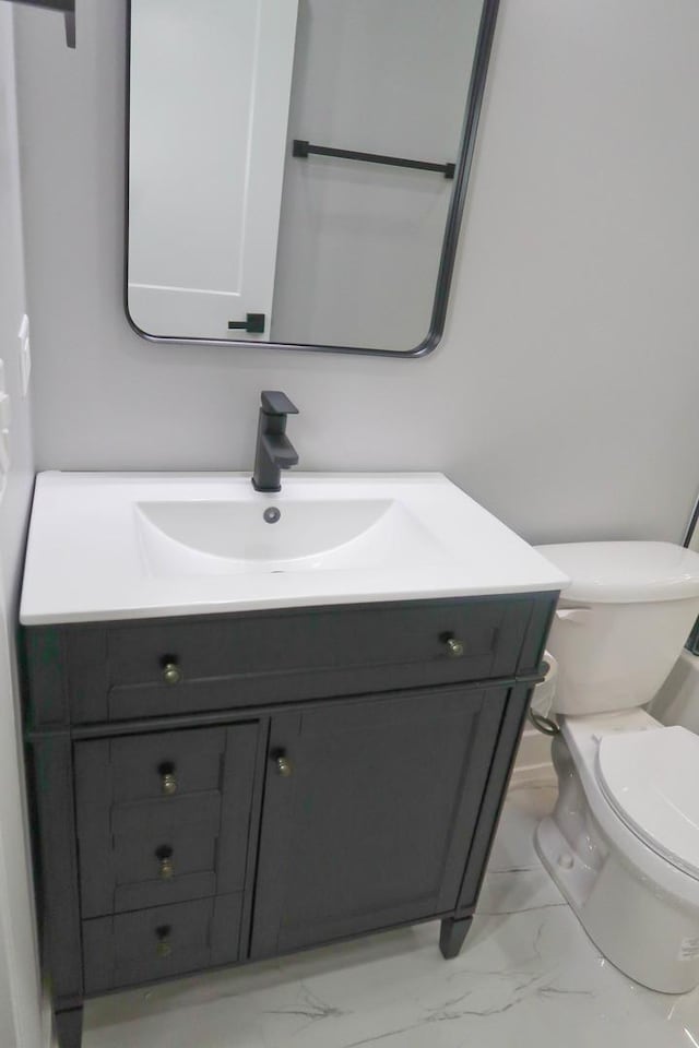 369 Ferndale Ct Unit B1, Schaumburg, IL 60193 - bathroom featuring marble finish floors and vanity