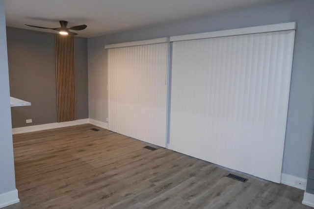 369 Ferndale Ct Unit B1, Schaumburg, IL 60193 - empty room with a ceiling fan and wood finished floors