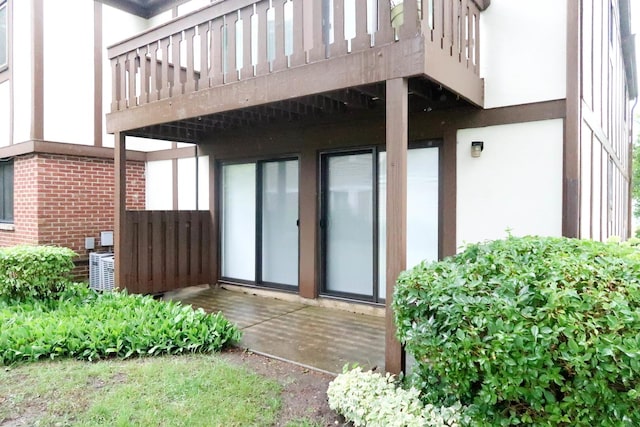 369 Ferndale Ct Unit B1, Schaumburg, IL 60193 - property entrance with stucco siding and a balcony