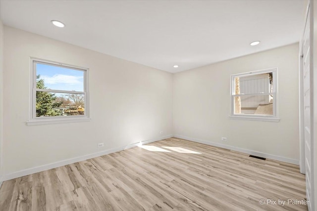 215 Brighton Rd, Elk Grove Village, IL 60007 - spare room with light wood-style floors and recessed lighting