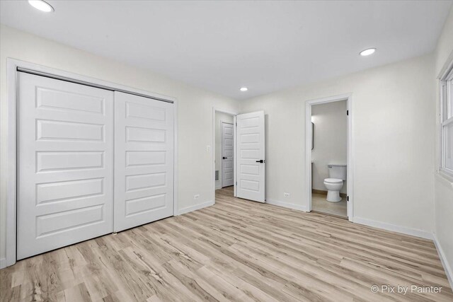 215 Brighton Rd, Elk Grove Village, IL 60007 - unfurnished bedroom with light wood-style floors, a closet, ensuite bath, and recessed lighting