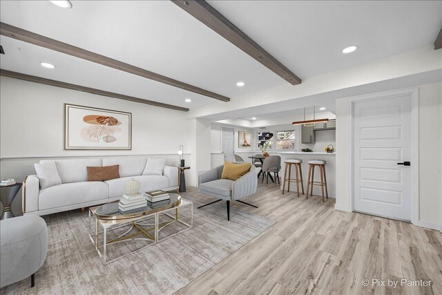 215 Brighton Rd, Elk Grove Village, IL 60007 - living room featuring beam ceiling, recessed lighting, light wood-style flooring, and bar