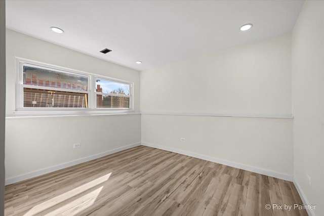215 Brighton Rd, Elk Grove Village, IL 60007 - spare room with wood finished floors and recessed lighting