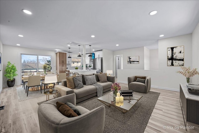 215 Brighton Rd, Elk Grove Village, IL 60007 - living room featuring light wood-style floors and recessed lighting