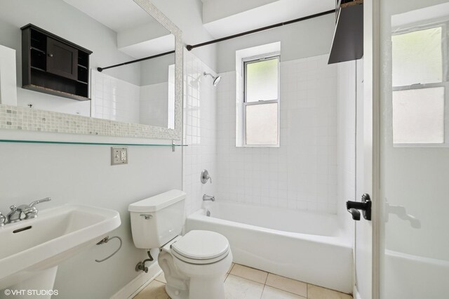 4510 N Ashland Ave Unit Gw, Chicago, IL 60640 - bathroom featuring  shower combination and tile patterned floors