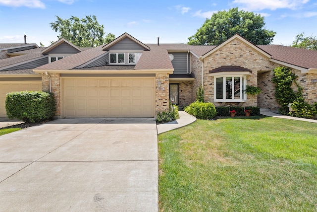 500 W Evergreen St, Wheaton, IL 60187 - view of front of property featuring an attached garage, driveway, brick siding, a front lawn, and a shingled roof