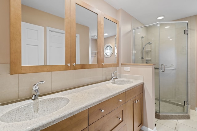 500 W Evergreen St, Wheaton, IL 60187 - bathroom with a stall shower, double vanity, and tile patterned flooring