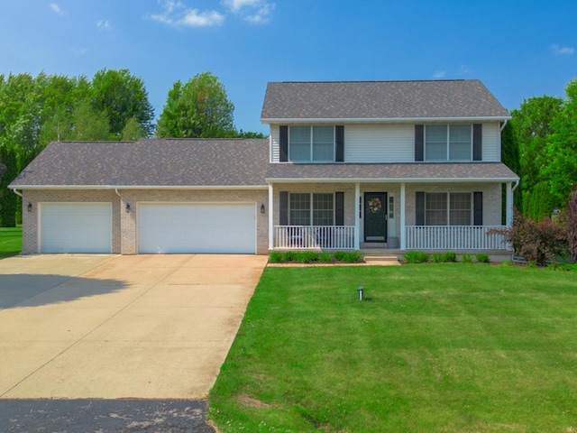 4526 Winn Rd, Sterling, IL 61081 - view of front of house with driveway, a front lawn, and a garage