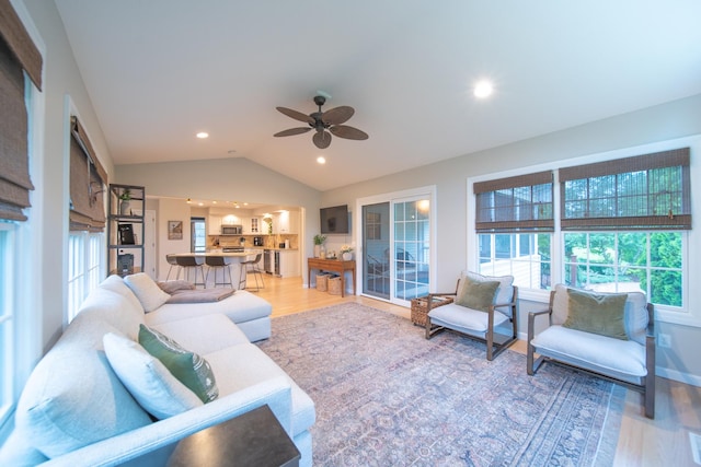 4526 Winn Rd, Sterling, IL 61081 - living room featuring light wood-style flooring, ceiling fan, lofted ceiling, and recessed lighting