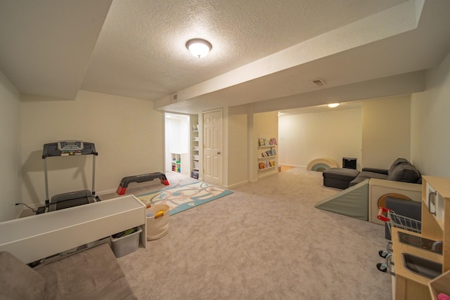 4526 Winn Rd, Sterling, IL 61081 - rec room featuring a textured ceiling and carpet