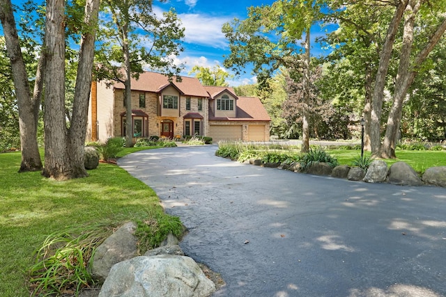 195 Hollow Way, Ingleside, IL 60041 - view of front of home with driveway and brick siding