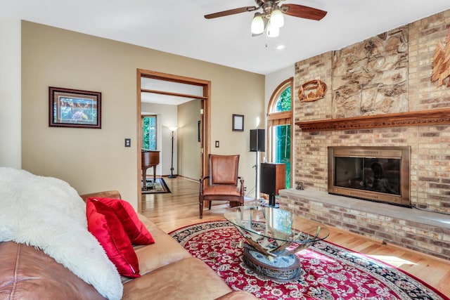 195 Hollow Way, Ingleside, IL 60041 - living room featuring a ceiling fan, wood finished floors, and a fireplace