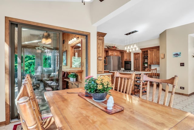 195 Hollow Way, Ingleside, IL 60041 - dining room featuring ceiling fan and a chandelier