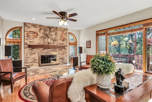 195 Hollow Way, Ingleside, IL 60041 - living room featuring wood finished floors, a ceiling fan, a brick fireplace, and recessed lighting