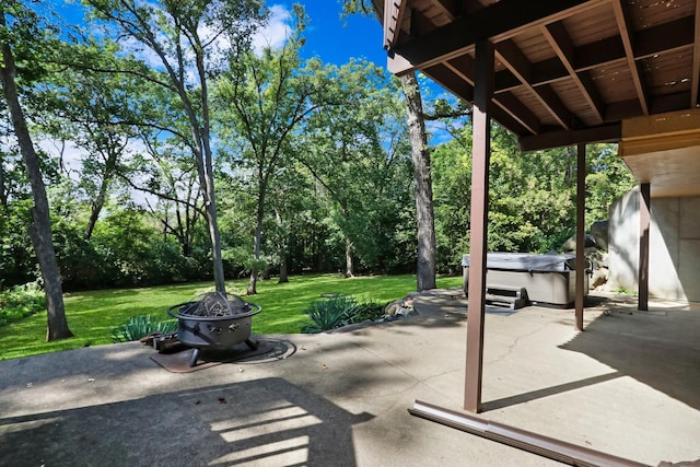 195 Hollow Way, Ingleside, IL 60041 - view of patio / terrace featuring a hot tub, a fire pit, and view of wooded area