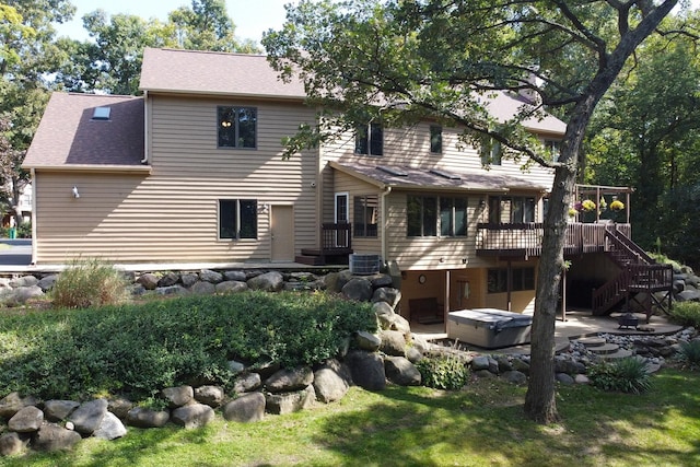 195 Hollow Way, Ingleside, IL 60041 - back of property featuring a wooden deck, a hot tub, a patio area, stairs, and roof with shingles