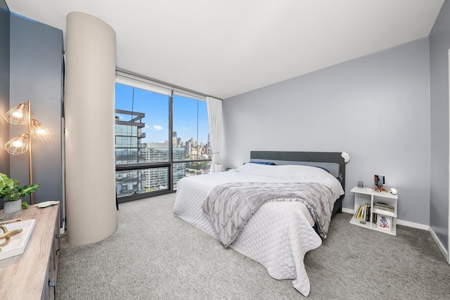 860 W Blackhawk St Unit 2106, Chicago, IL 60642 - carpeted bedroom with a wall of windows and a city view