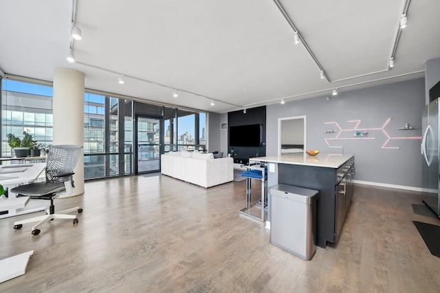 860 W Blackhawk St Unit 2106, Chicago, IL 60642 - office space featuring rail lighting, wood finished floors, and expansive windows